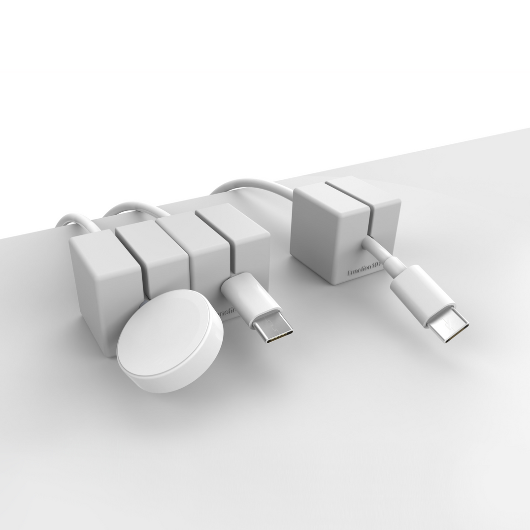 CABLE BLOCKS Magnetic and Weighted Cord Organizers (Light gray on end of a table.